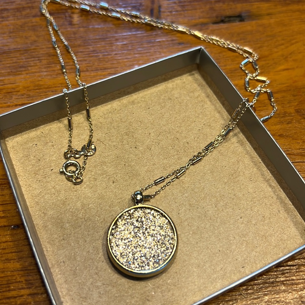 Loft gold necklace, gold glitter and black glitter charm on reverse